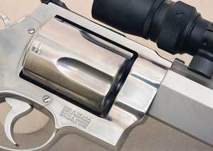 Don’t EVER hold a revolver near the front of the cylinder! The area where the cylinder meets the barrel has a tiny gap where hot gasses can escape and can cause serious injury. Your hands should be touching each other when firing a handgun.