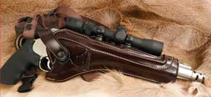 Large-caliber hunting handguns are heavy, but this Galco Kodiak Hunter holster is designed to hold even the largest, scoped handgun (this is a S&W .460 Magnum) secure and comfortable on the hunter’s chest, while still being accessible and quiet while drawing it when needed.